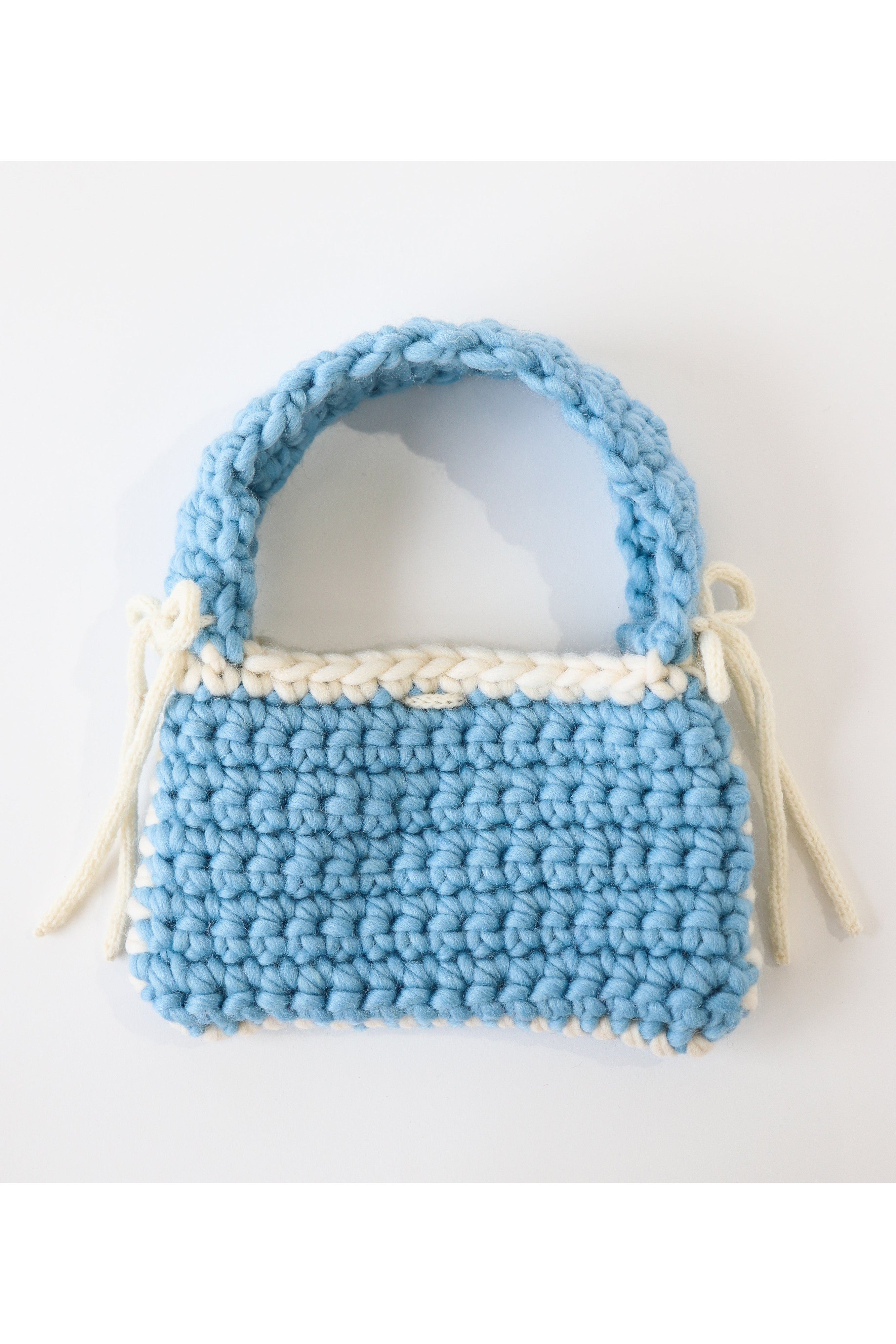 Elsa B. handmade in Italy light and dark beige woven wood basket selling top handle bag with blue denim inside pouch