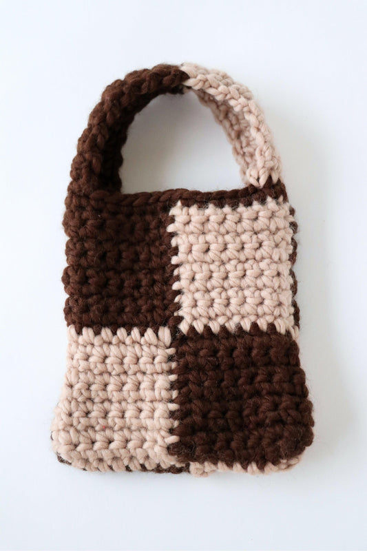 Brown and tan checkered crochet bag handmade with wool yarn.