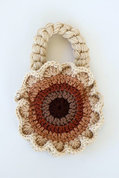 Flower shaped brown ombré crochet shoulder bag handmade with acrylic yarn.