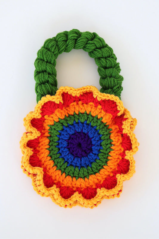 Flower shaped rainbow crochet shoulder bag handmade with acrylic yarn.
