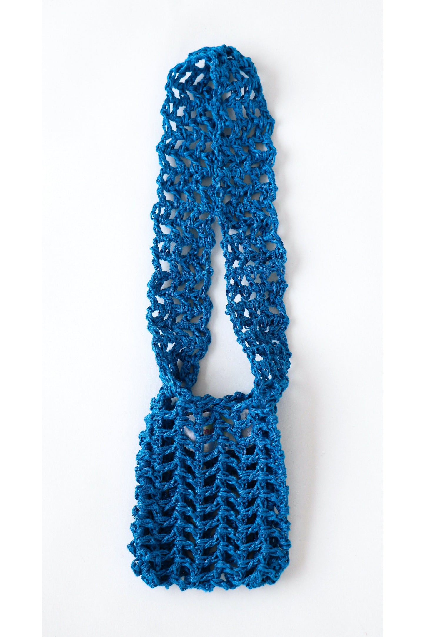 Crochet fishnet style crossbody pouch in blue handmade with linen yarn.