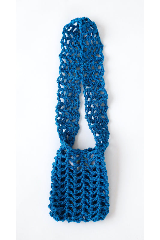 Crochet fishnet style crossbody pouch in blue handmade with linen yarn.