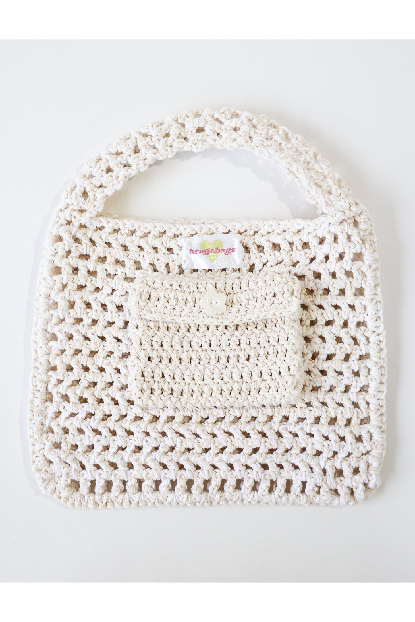 Inside of Milk color way two-tone crochet fishnet tote bag handmade with cotton yarn.