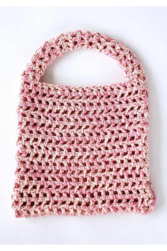 Front of Shortcake color way two-tone crochet fishnet tote bag handmade with cotton yarn.