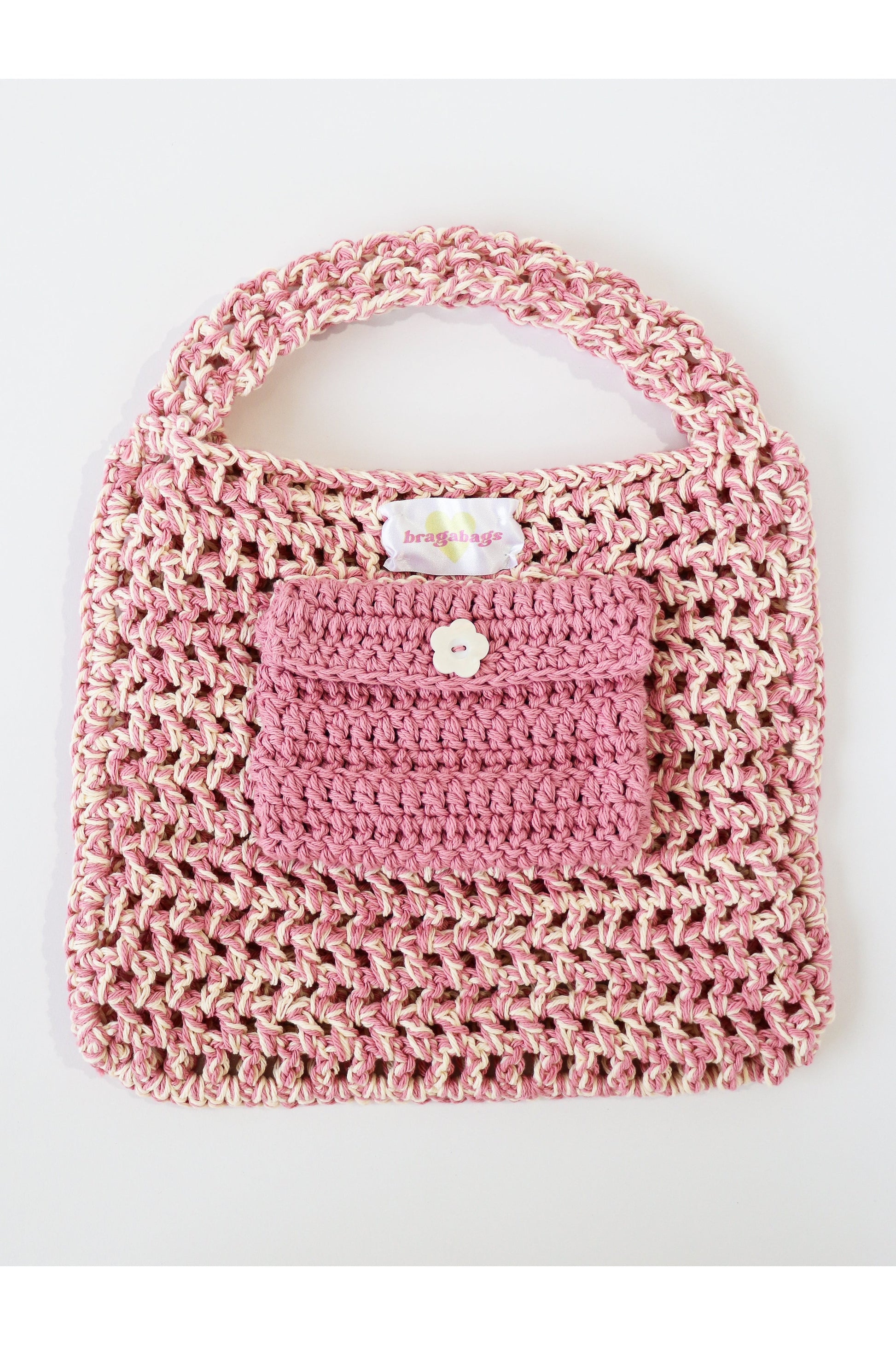 Inside of Shortcake color way two-tone crochet fishnet tote bag handmade with cotton yarn.