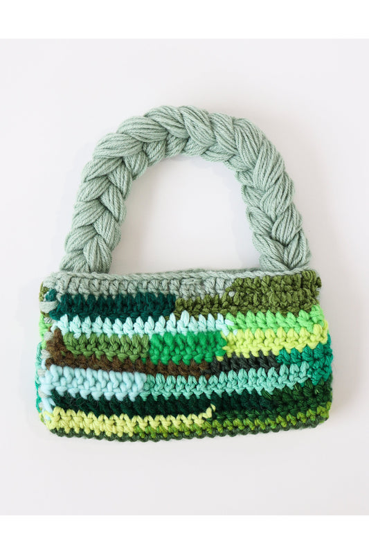 Green color way crochet shoulder bag handmade with a variety of scrap yarn.